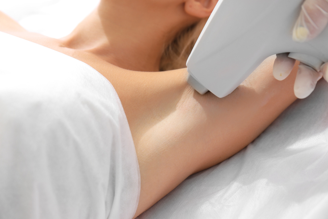 Woman Getting Laser Treatment on Her Armpit 